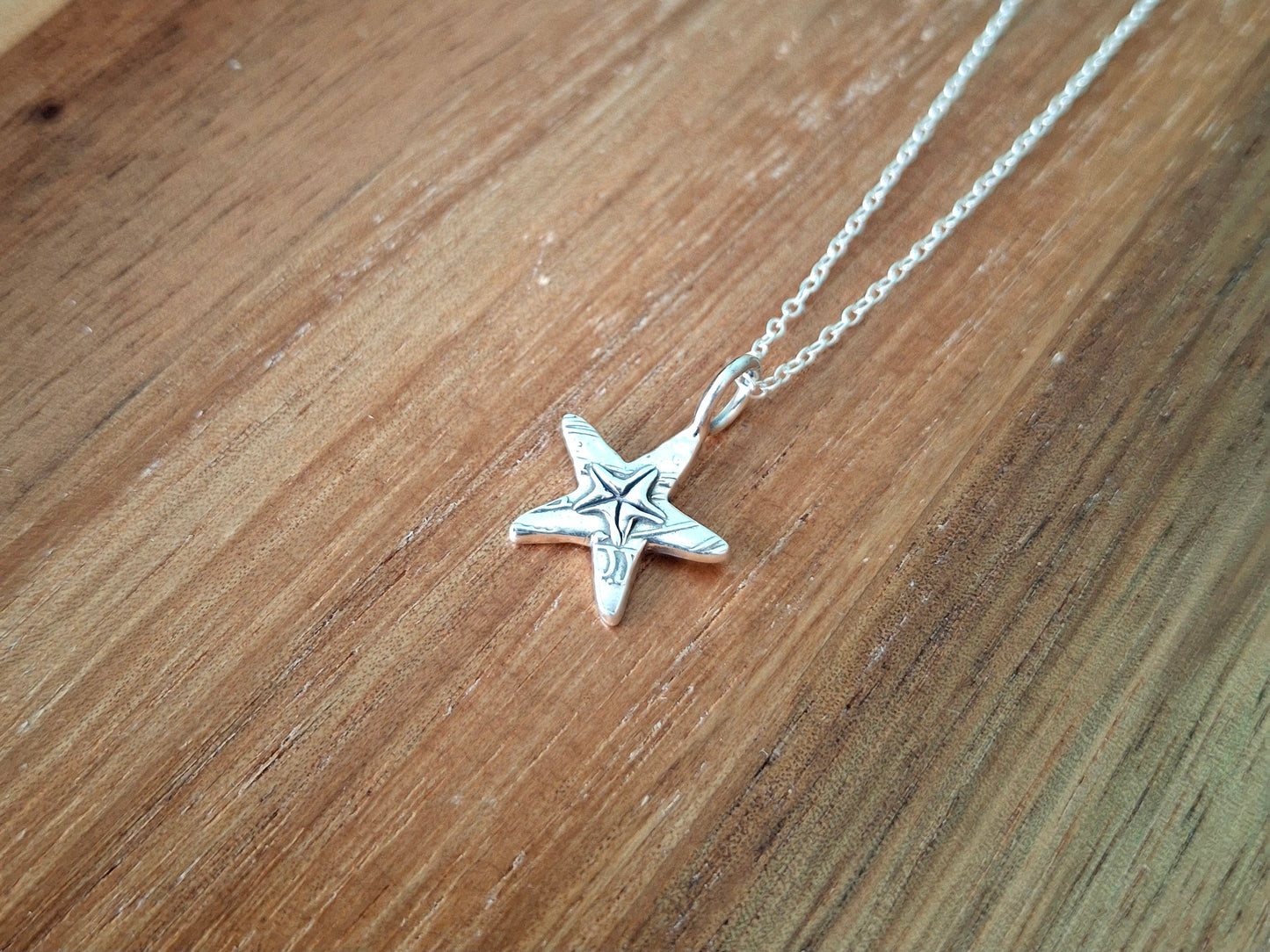 Silver Starfish Charm Necklace with Shell Pattern