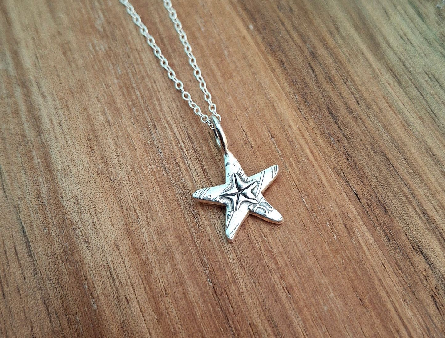 Silver Starfish Charm Necklace with Shell Pattern