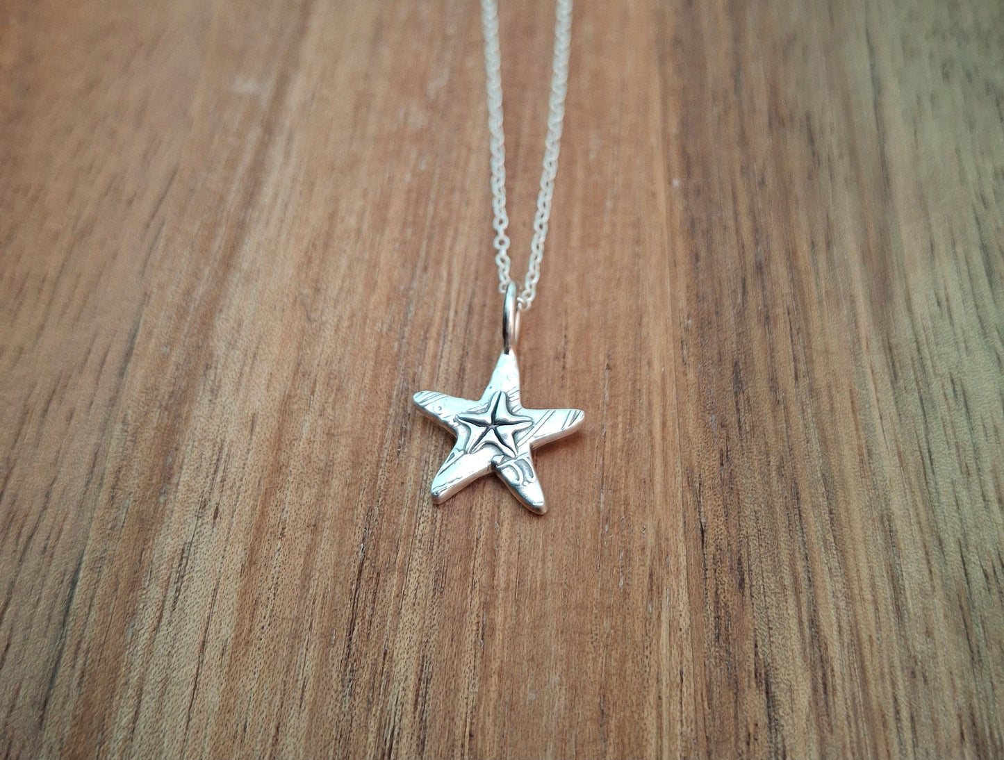 Silver Starfish Charm Necklace with Shell Pattern