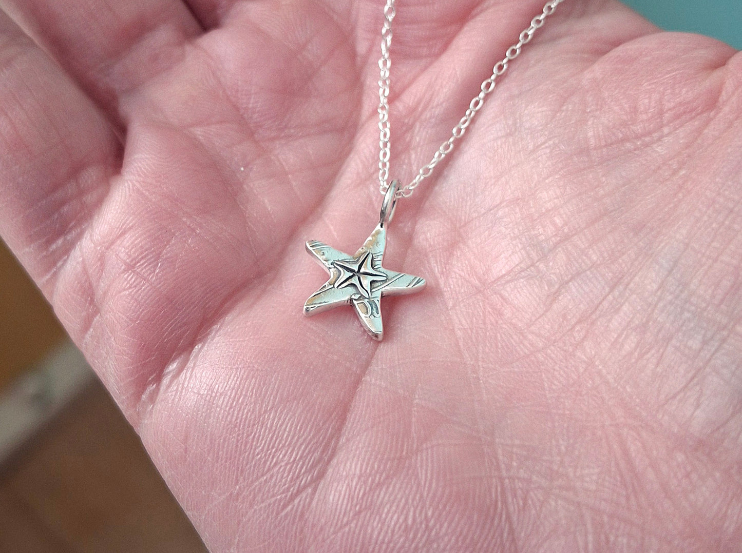 Silver Starfish Charm Necklace with Shell Pattern
