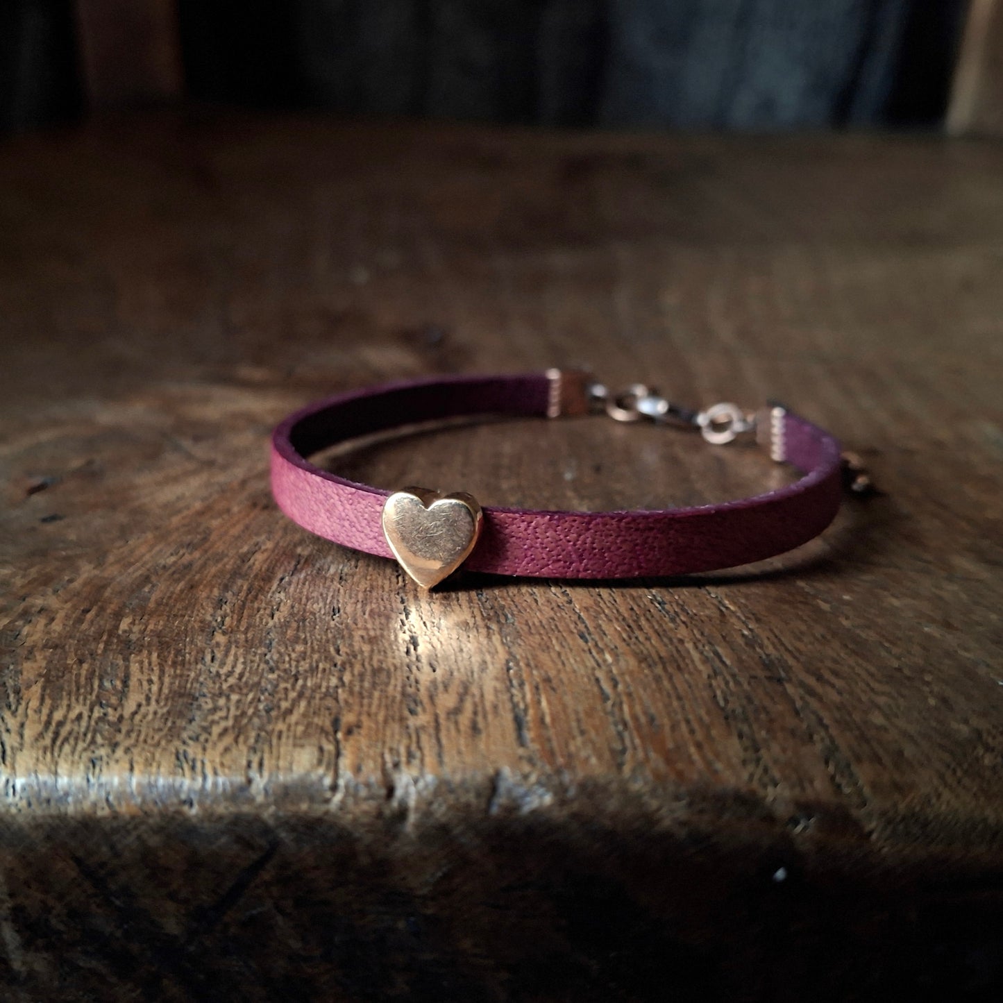 Plum Coloured Leather Bracelet with Red Gold Heart Bead