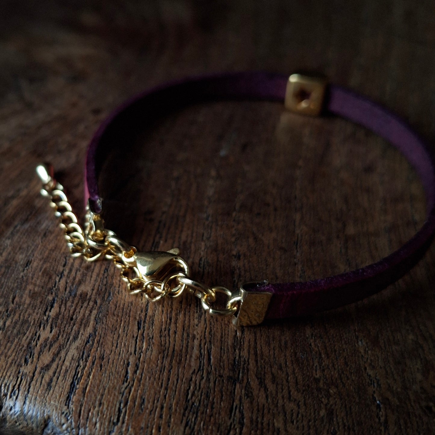 Plum Coloured Leather Bracelet with Gold Square Star Bead