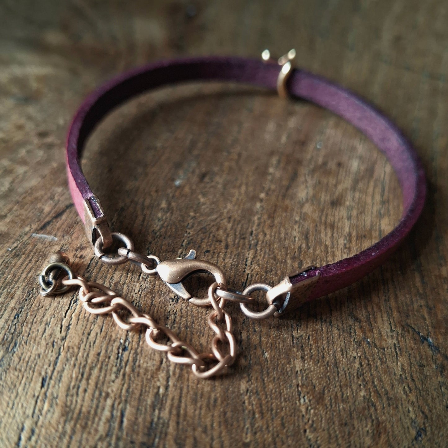 Plum Coloured Leather Bracelet with Red Gold Star Bead