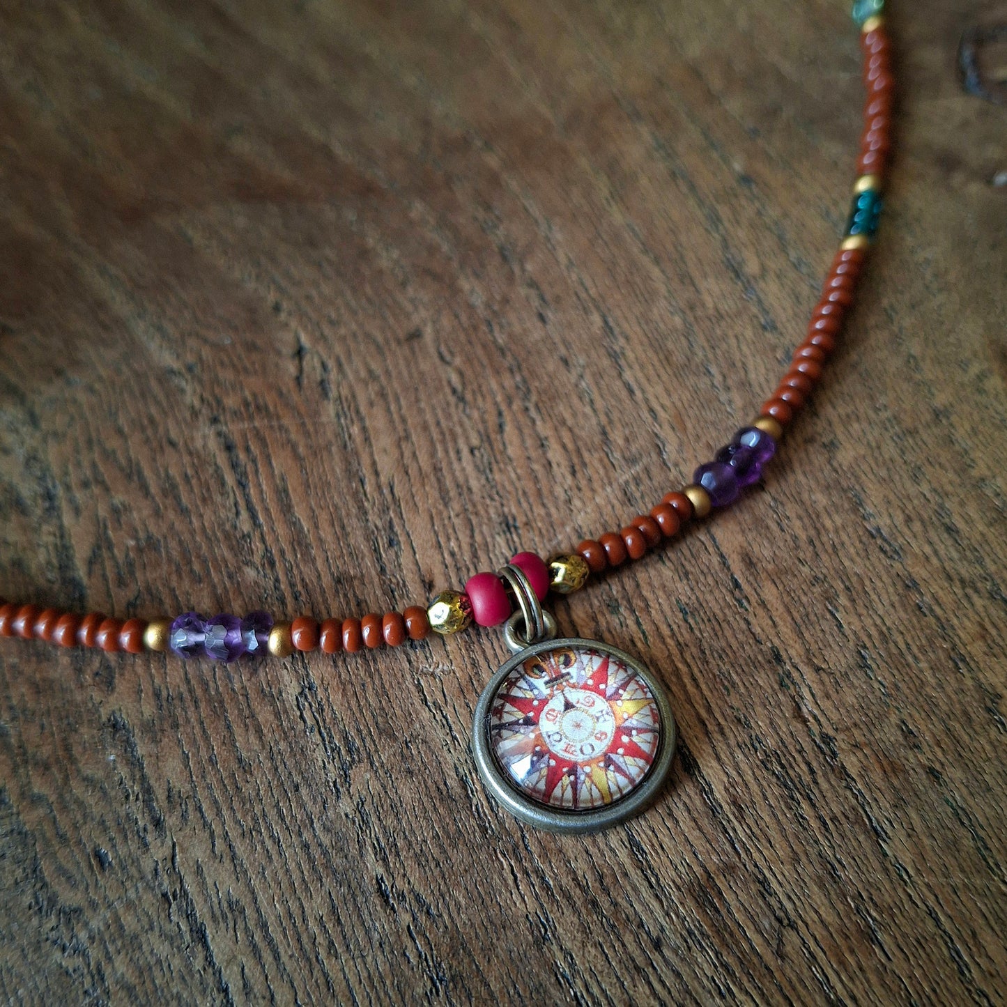Harlequin Compass Charm Necklace with Vibrant Coloured Seed Beads