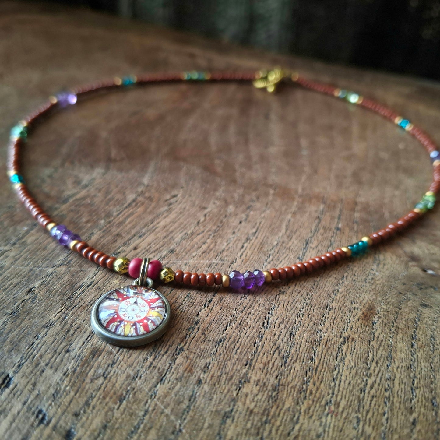 Harlequin Compass Charm Necklace with Vibrant Coloured Seed Beads