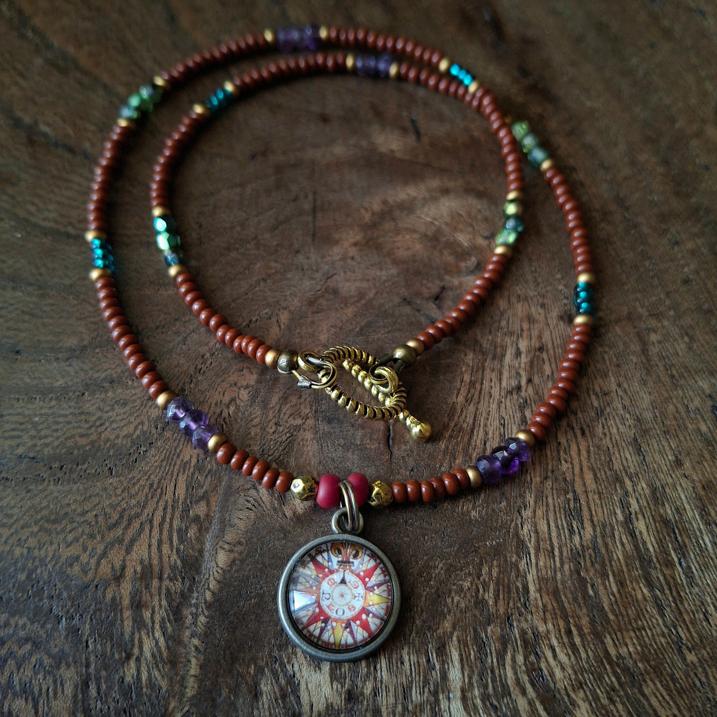Harlequin Compass Charm Necklace with Vibrant Coloured Seed Beads