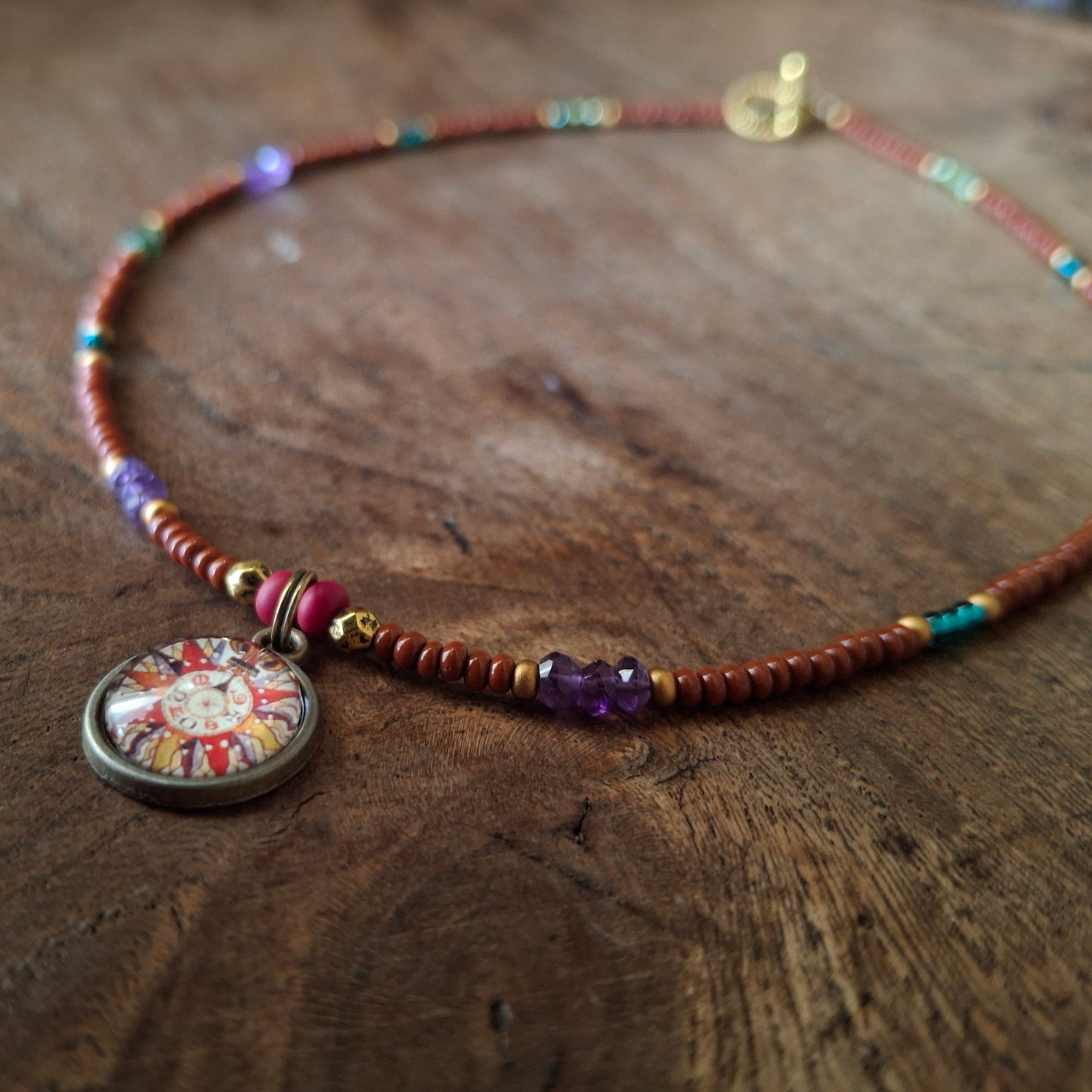 Harlequin Compass Charm Necklace with Vibrant Coloured Seed Beads