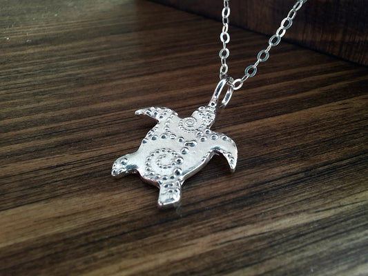 Silver Turtle Charm Necklace with Dotted Wave Pattern
