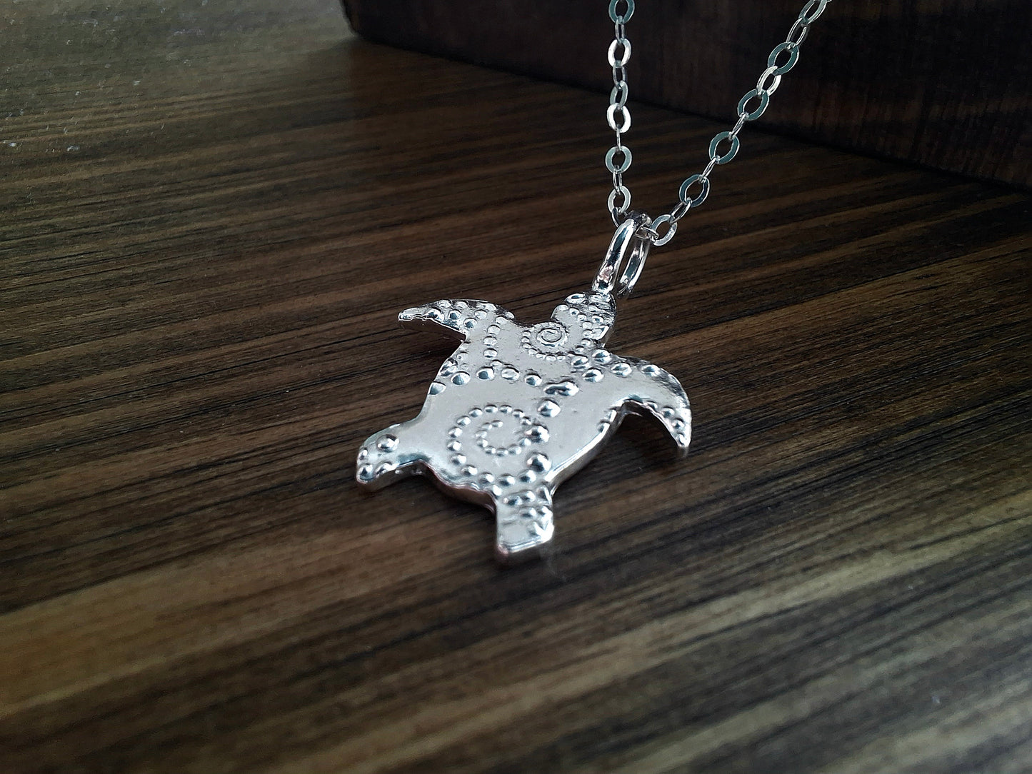 Silver Turtle Charm Necklace with Dotted Wave Pattern