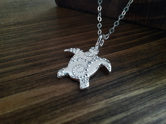 Silver Turtle Charm Necklace with Dotted Wave Pattern
